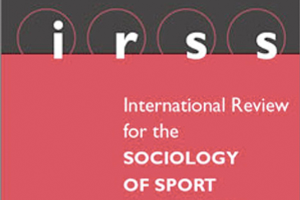 The title "International Review for the Sociology of Sport" in white over a black and red background.